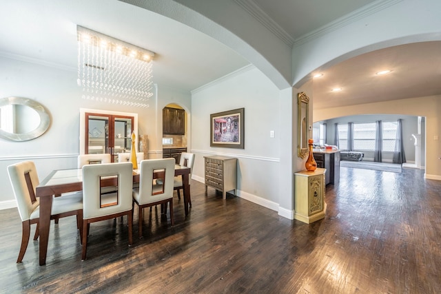 1005 Caudle Ln, Savannah, TX 76227 - dining space featuring arched walkways, dark wood-type flooring, crown molding, baseboards, and recessed lighting