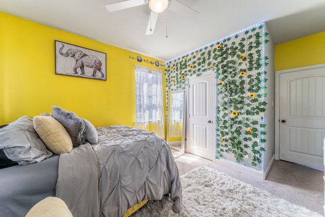1005 Caudle Ln, Savannah, TX 76227 - carpeted bedroom featuring a ceiling fan and baseboards