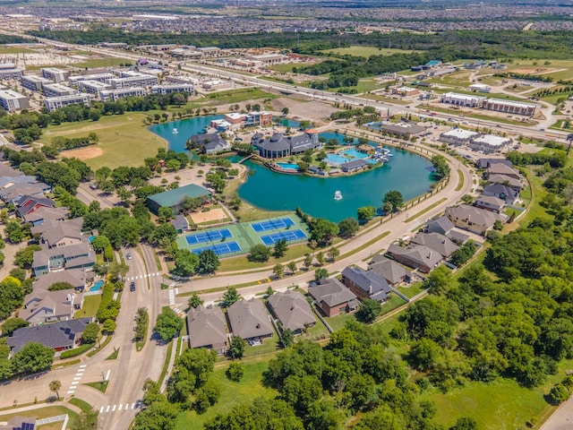1005 Caudle Ln, Savannah, TX 76227 - aerial perspective of suburban area with a nearby body of water