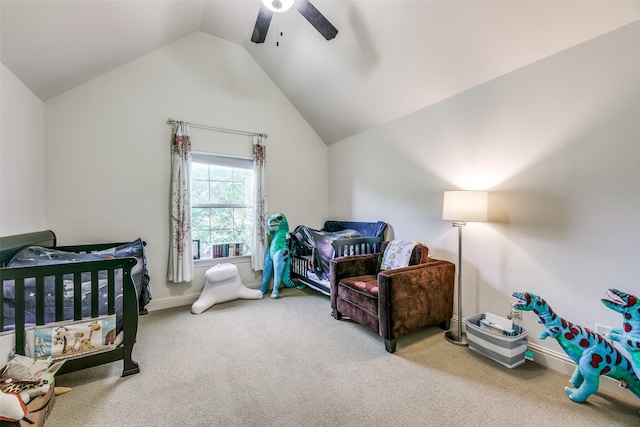 carpeted bedroom with vaulted ceiling and ceiling fan