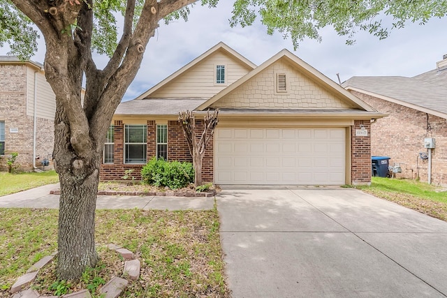 12113 Tacoma Ridge Dr, Fort Worth, TX 76244 - view of front facade featuring brick siding, a garage, and concrete driveway
