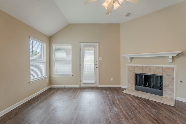 12113 Tacoma Ridge Dr, Fort Worth, TX 76244 - unfurnished living room featuring ceiling fan, wood finished floors, a fireplace, baseboards, and lofted ceiling