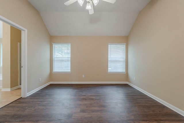 12113 Tacoma Ridge Dr, Fort Worth, TX 76244 - empty room with lofted ceiling, a ceiling fan, wood finished floors, and baseboards