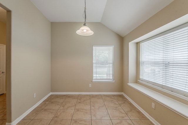 12113 Tacoma Ridge Dr, Fort Worth, TX 76244 - empty room with lofted ceiling, light tile patterned floors, and baseboards