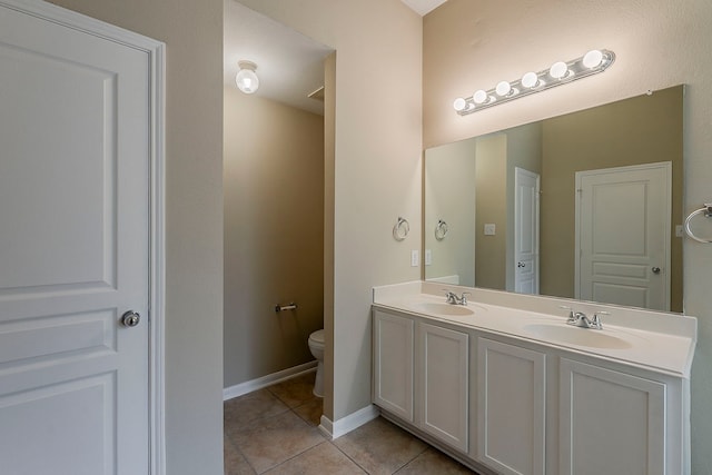 12113 Tacoma Ridge Dr, Fort Worth, TX 76244 - full bathroom with tile patterned flooring, toilet, double vanity, and baseboards