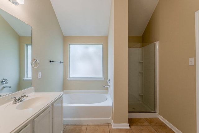 12113 Tacoma Ridge Dr, Fort Worth, TX 76244 - full bath with tile patterned floors, healthy amount of natural light, a shower stall, a garden tub, and lofted ceiling