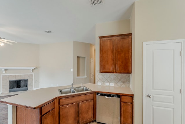 12113 Tacoma Ridge Dr, Fort Worth, TX 76244 - kitchen with dishwasher, a sink, a peninsula, a ceiling fan, and open floor plan