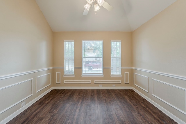 12113 Tacoma Ridge Dr, Fort Worth, TX 76244 - unfurnished room with lofted ceiling, dark wood-type flooring, a decorative wall, a ceiling fan, and a wainscoted wall