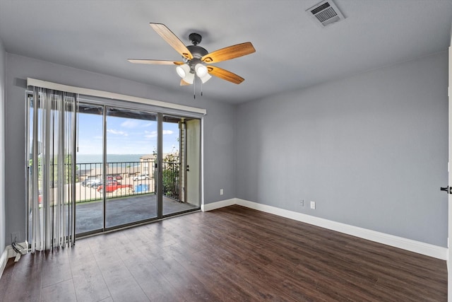 154 Henry M Chandler Dr, Rockwall, TX 75032 - unfurnished room with baseboards, ceiling fan, wood finished floors, and a water view