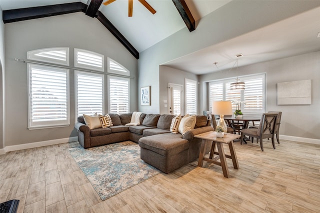 1912 Sunny Side Dr, Little Elm, TX 75068 - living room with baseboards, ceiling fan, and light wood finished floors