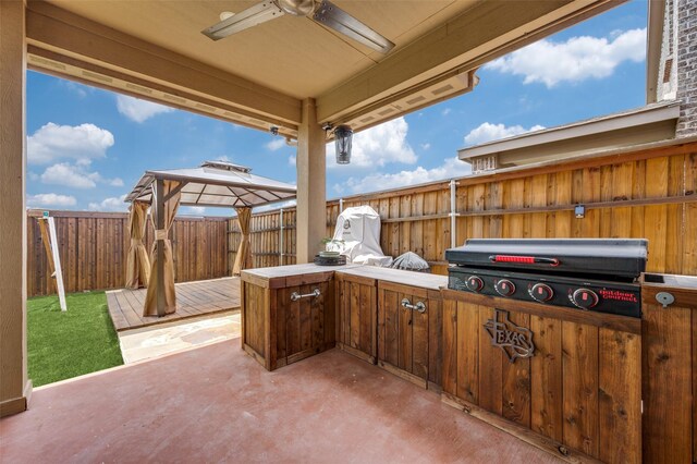 1912 Sunny Side Dr, Little Elm, TX 75068 - view of patio with a gazebo, area for grilling, a fenced backyard, and ceiling fan