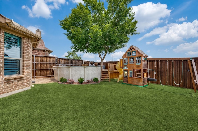 1912 Sunny Side Dr, Little Elm, TX 75068 - view of yard featuring a playground