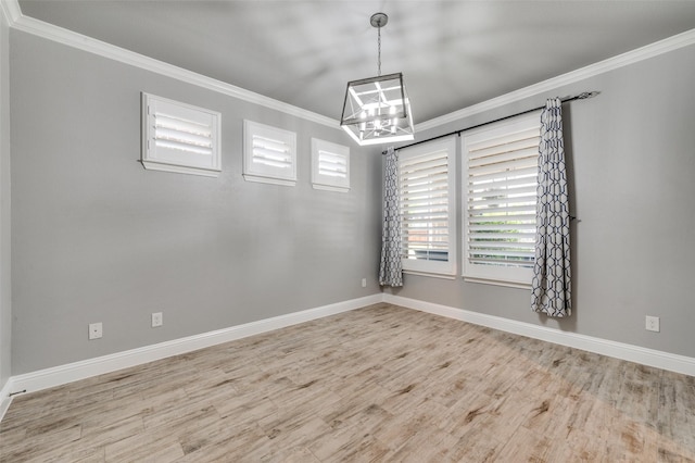 1912 Sunny Side Dr, Little Elm, TX 75068 - spare room with crown molding, a chandelier, wood finished floors, and baseboards