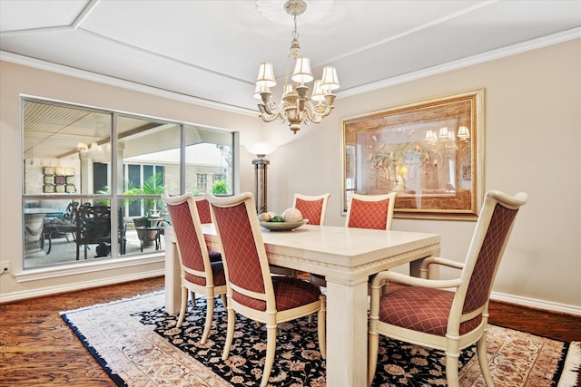 4322 Glenaire Dr, Dallas, TX 75229 - dining area featuring a chandelier, wood finished floors, baseboards, and ornamental molding