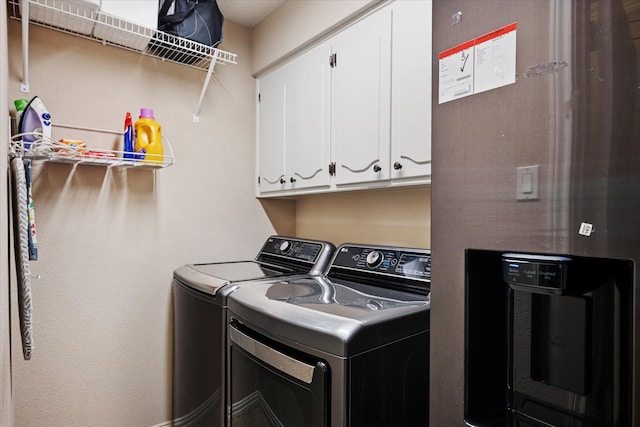 4322 Glenaire Dr, Dallas, TX 75229 - laundry area with cabinet space and separate washer and dryer