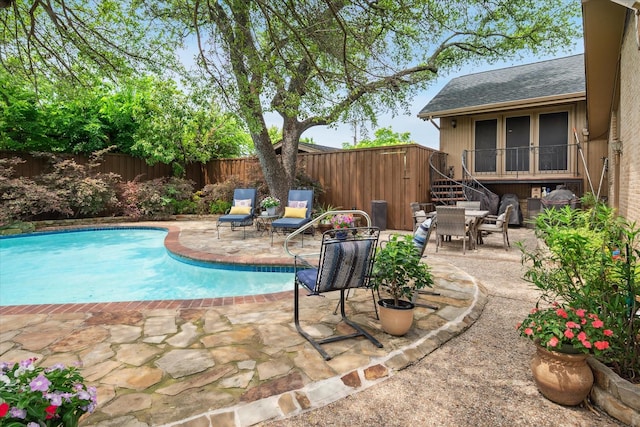 4322 Glenaire Dr, Dallas, TX 75229 - view of swimming pool featuring a fenced backyard, a patio area, and outdoor dining area