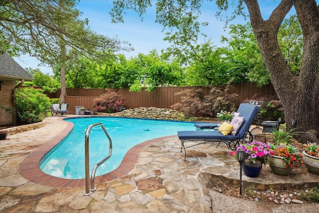 4322 Glenaire Dr, Dallas, TX 75229 - view of swimming pool with a fenced backyard and a patio