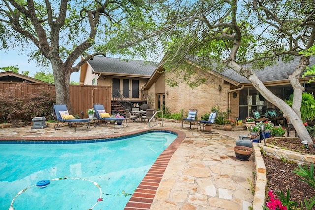 4322 Glenaire Dr, Dallas, TX 75229 - view of swimming pool with a patio area and fence