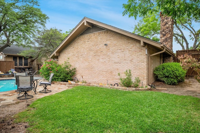 4322 Glenaire Dr, Dallas, TX 75229 - view of side of home with brick siding and a patio