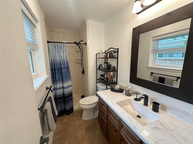 922 S Valentine Dr, Sherman, TX 75090 - bathroom with vanity, toilet, and a shower with curtain