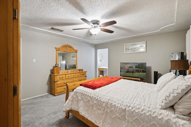 7108 Stonybrooke Dr, North Richland Hills, TX 76182 - carpeted bedroom with a textured ceiling, a ceiling fan, and baseboards
