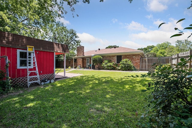 7108 Stonybrooke Dr, North Richland Hills, TX 76182 - view of yard featuring an outbuilding and a storage unit