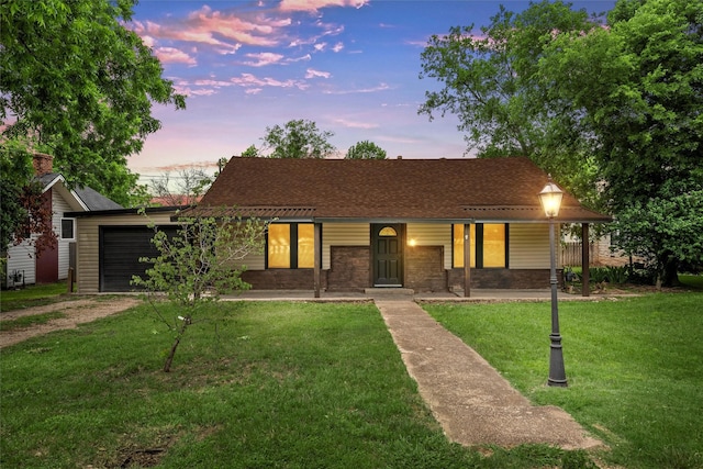 306 N Bordon St, Lorena, TX 76655 - view of front facade featuring driveway, a garage, a yard, and covered porch