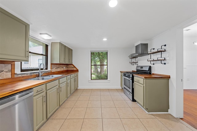 306 N Bordon St, Lorena, TX 76655 - kitchen with appliances with stainless steel finishes, extractor fan, a sink, wooden counters, and recessed lighting