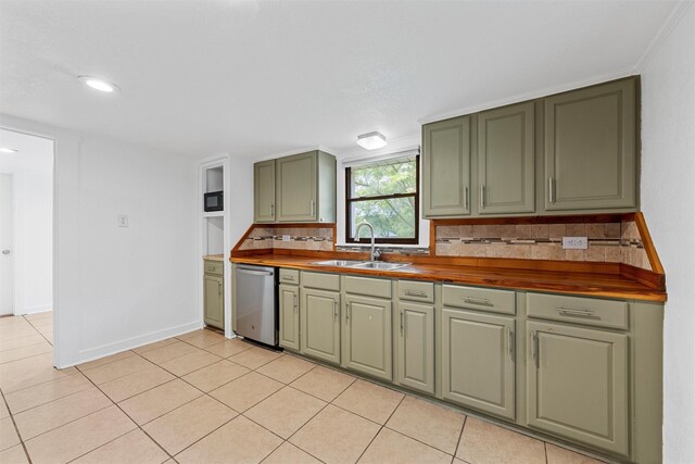 306 N Bordon St, Lorena, TX 76655 - kitchen featuring green cabinetry, a sink, dishwasher, backsplash, and baseboards