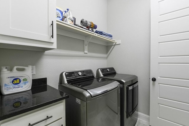 2720 Creek Crossing Ln, Midlothian, TX 76065 - clothes washing area with washer and dryer and cabinet space