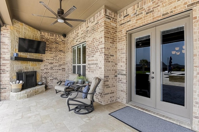 2720 Creek Crossing Ln, Midlothian, TX 76065 - view of patio / terrace with a fireplace, french doors, and ceiling fan