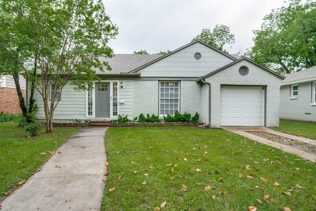 2614 Ivandell Ave, Dallas, TX 75211 - ranch-style home with a front yard, a garage, brick siding, and a shingled roof