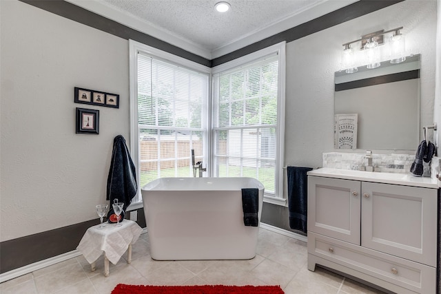 2614 Ivandell Ave, Dallas, TX 75211 - bathroom featuring a textured ceiling, a soaking tub, vanity, tile patterned flooring, and a textured wall