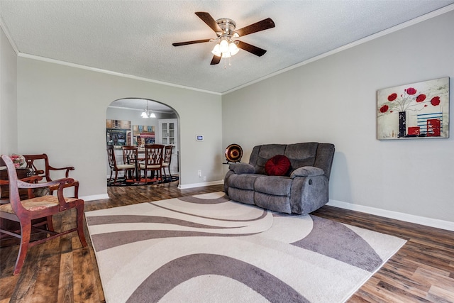 2614 Ivandell Ave, Dallas, TX 75211 - living area with wood finished floors, arched walkways, a textured ceiling, ceiling fan, and baseboards