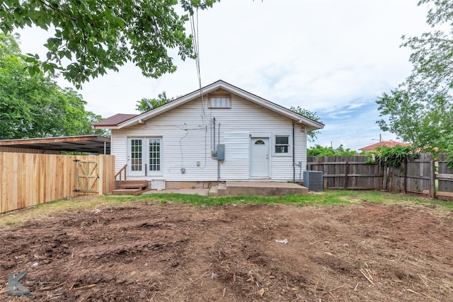 1810 Merchant St, Abilene, TX 79603 - back of property with central AC unit, a fenced backyard, and a gate