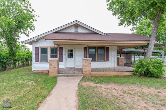 1810 Merchant St, Abilene, TX 79603 - view of front of house featuring covered porch, a shingled roof, and a front lawn