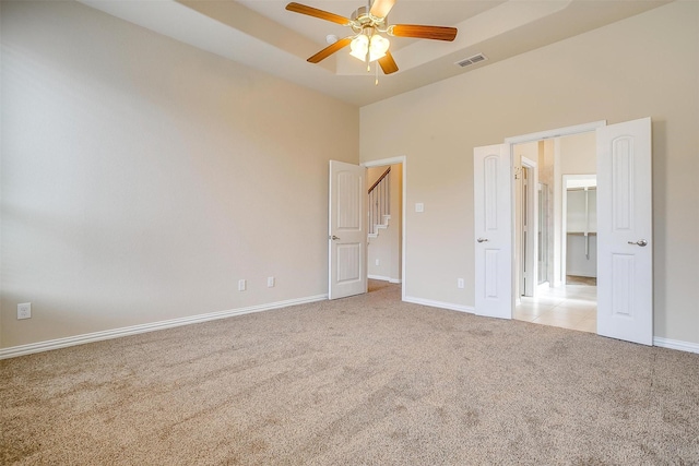 205 Mineral Point Dr, Aledo, TX 76008 - unfurnished bedroom with a towering ceiling, light carpet, baseboards, and ceiling fan