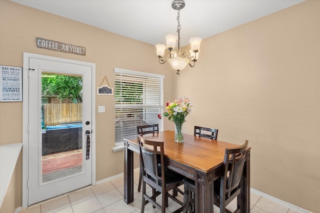 836 Heberle Dr, Burleson, TX 76028 - dining area featuring a chandelier, light tile patterned floors, and baseboards