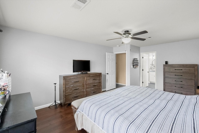 836 Heberle Dr, Burleson, TX 76028 - bedroom featuring baseboards, dark wood-style floors, ceiling fan, and connected bathroom