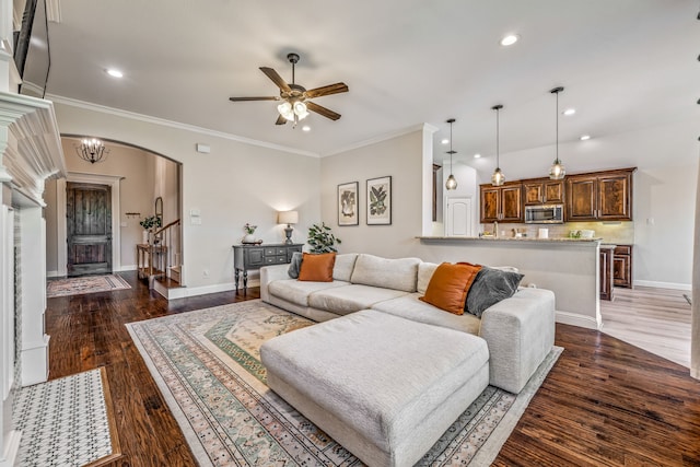 437 Sagebrush Dr, Aledo, TX 76008 - living area featuring arched walkways, ceiling fan, recessed lighting, dark wood finished floors, and baseboards