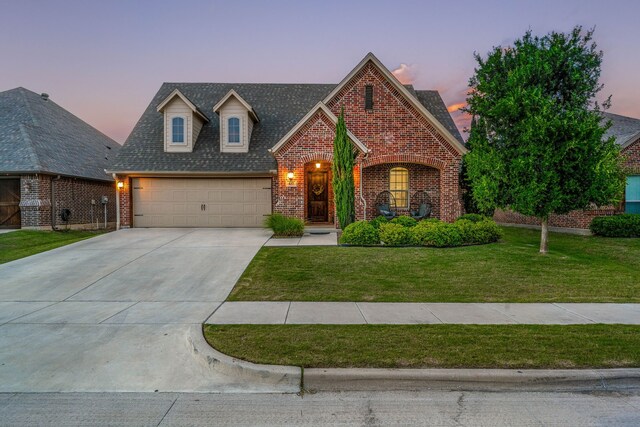437 Sagebrush Dr, Aledo, TX 76008 - view of front of home with brick siding, concrete driveway, a garage, a lawn, and a shingled roof