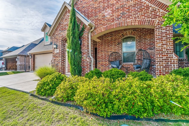 437 Sagebrush Dr, Aledo, TX 76008 - view of front of property featuring brick siding, concrete driveway, and a garage