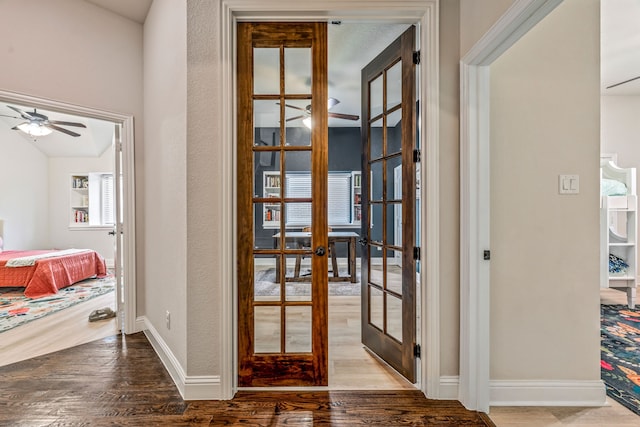 437 Sagebrush Dr, Aledo, TX 76008 - corridor featuring french doors, wood finished floors, and baseboards