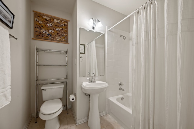 2305 Worthington St Unit 328, Dallas, TX 75204 - full bathroom featuring tile patterned floors, toilet, and baseboards