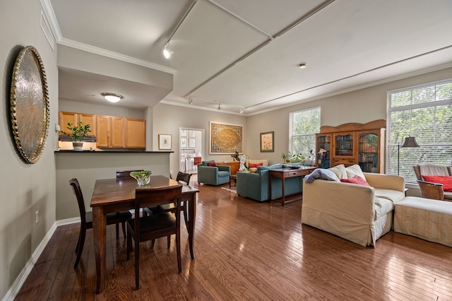 2305 Worthington St Unit 328, Dallas, TX 75204 - dining room featuring rail lighting, dark wood-style floors, ornamental molding, and baseboards