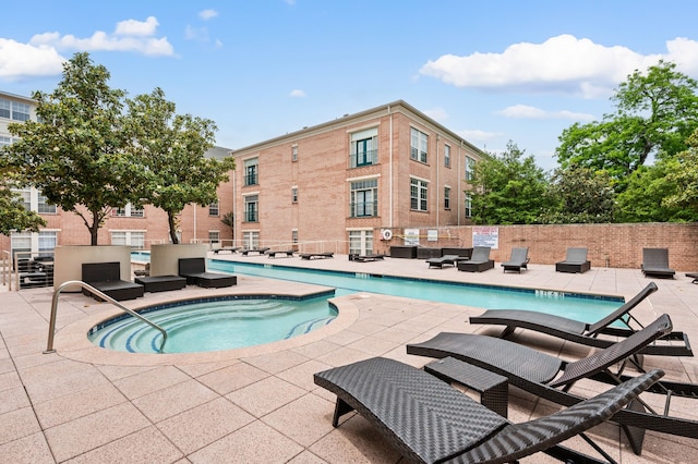 2305 Worthington St Unit 328, Dallas, TX 75204 - community pool featuring a patio and a community hot tub