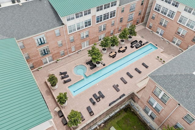 2305 Worthington St Unit 328, Dallas, TX 75204 - view of subject property with a pool
