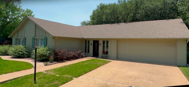 3417 Fern Hill Cir, Waco, TX 76708 - single story home featuring a garage, driveway, and a shingled roof