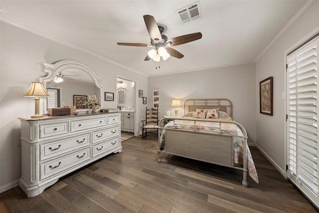 3417 Fern Hill Cir, Waco, TX 76708 - bedroom with dark wood finished floors, ornamental molding, baseboards, a ceiling fan, and ensuite bathroom