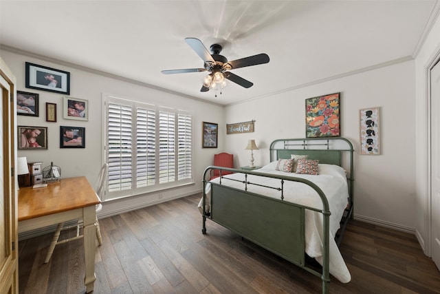 3417 Fern Hill Cir, Waco, TX 76708 - bedroom featuring dark wood-style floors, ornamental molding, a ceiling fan, baseboards, and a desk